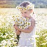 41068231-cute-little-smiling-girl-in-the-chamomile-field-in-spring.jpg